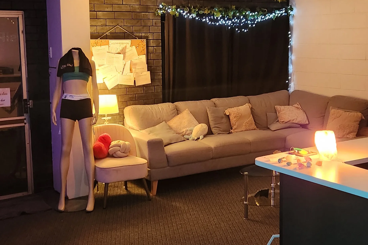 Reception - the comfiest couch you'll ever meet, home to many pre- and post-class chats and crashouts.